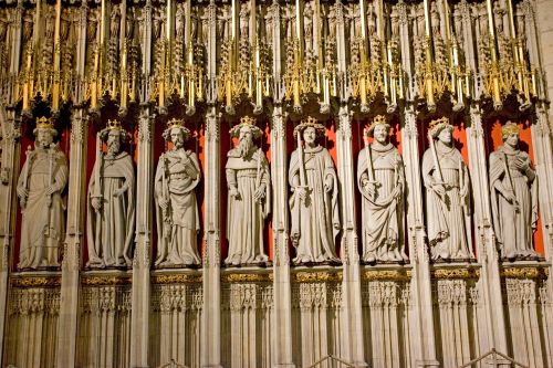 Stone statues of saints inside York Minster cathedral York UK